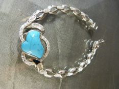 Silver bracelet set with turquoise and CZs