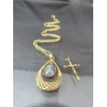 Ladies Necklace with central Opal and an additional twisted cross pendant