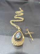 Ladies Necklace with central Opal and an additional twisted cross pendant