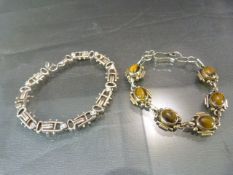 Vintage (1976) silver CZ set bracelet by JAH 7" long. Another silver (925) Tigers eye set bracelet