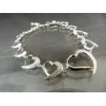 Silver and CZ bracelet in the form of a row of hearts