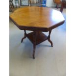 Victorian mahogany hexagonal table with reeded decoration to sides. Stood on four turned legs with