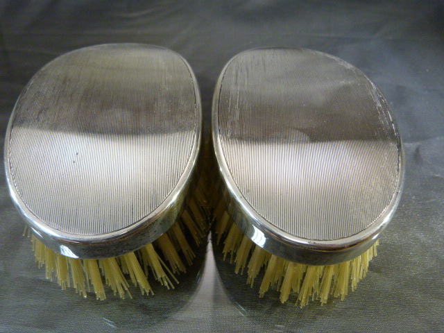 Pair of unused silver hallmarked clothes brushes with engine turned decoration, dated 1946 - Image 2 of 5