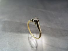 18ct Diamond Solitaire ring. The diamond set in Platinum with 18ct gold shank.HG & S Approx Weight -