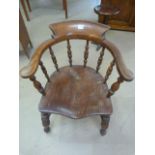 Antique oak smokers Elbow Bow chair with baluster shaped legs