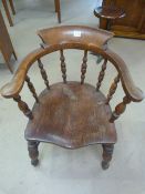 Antique oak smokers Elbow Bow chair with baluster shaped legs