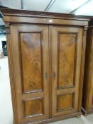 Antique Mahogany two door wardrobe with detailing to each door