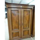 Antique Mahogany two door wardrobe with detailing to each door