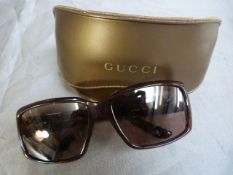 Pair of Gucci sunglasses with prescription lenses