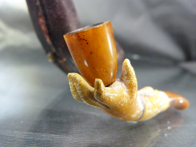 Carved Meerschaum in the form of a hand holding a bowl. Bowl made from amber as is the Mouthpiece in - Image 4 of 7