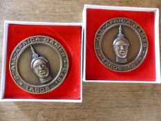 Two 2nd All Africa Games medals, Lagos 1973, in presentation boxes, by Huguenin, Switzerland