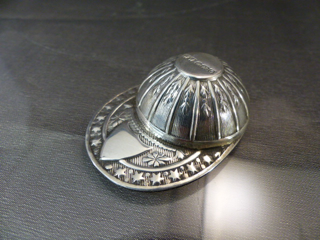 Hallmarked silver caddy spoon in the form of a Jockey's Cap. Hallmarks for Sheffield 1988. Maker