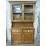 Large pine dresser with cupboards over and white handles
