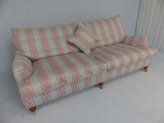 Duresta sofa with feather cushions. On turned wooden supports with castors