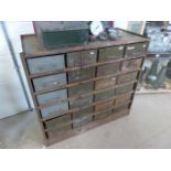 Military metal storage chest of 22 metal sliding trays/drawers.