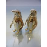 Pair of 800 silver condiments in the form of penguins with ruby eyes