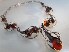 Silver and Baltic Amber necklace of Arts and Crafts style (Evald Nielsen) necklace compromising 7