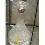Moulded glass decanter with hallmark silver collar. Marks for Birmingham F G Flavell Ltd 1988.