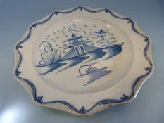 Liverpool Pearlware blue and white plate with applied draping in the Pagoda design.