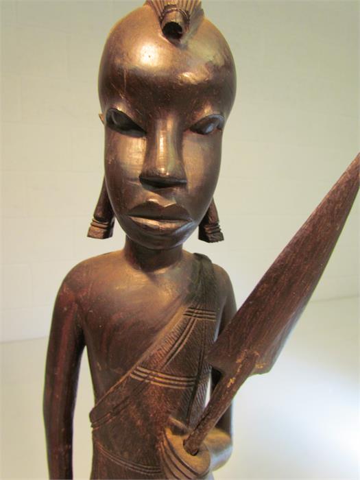 Two African statues carved in ebony coloured hardwood - one tribal warrior with spear. The other a - Image 2 of 5