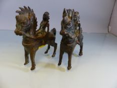 Pair of chinese Bronze Tang Horses with riders upon. 1 Missing an ear.