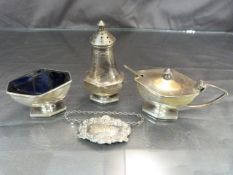 Small collection of hallmarked silver items to include a Sherry label and condiment set. Total