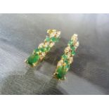 Pair of Diamond & Emerald drop earrings.