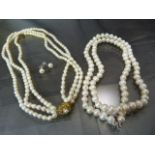 Bag containing 2 x Fresh Water Pearl Necklaces and 1 pair of similar Earrings