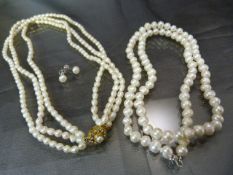 Bag containing 2 x Fresh Water Pearl Necklaces and 1 pair of similar Earrings