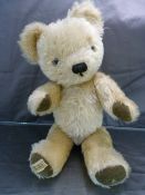 Vintage toys to include a Merrythought plush teddy, Pedigree hard plastic doll and three Rosebud