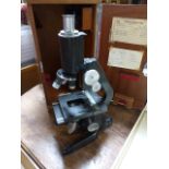 A Watson Barnet Service 1 microscope in wooden case. No 125387