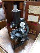 A Watson Barnet Service 1 microscope in wooden case. No 125387