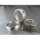 Three silver rings - approx weight -