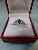 9ct ladies twisted gold ring set with central Emerald stone