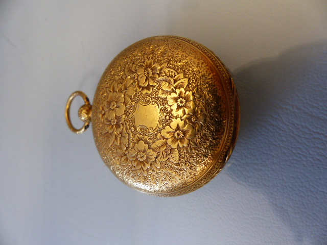 18ct Gold cased pocket watch. Winds and ticks. Roman Numeral Chapter ring. Back Decorated with - Image 3 of 4