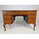 Ladies Queen Anne style knee hole desk with brown leather inlaid top, including six walnut