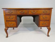 Ladies Queen Anne style knee hole desk with brown leather inlaid top, including six walnut