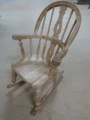 Pine childs Rocking chair in the shape of a Windsor chair