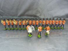 Twenty one Britains military marching band members, all hand painted with movable arms and an
