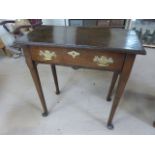 Antique oak georgian side table with single drawer on tapering cabriole legs.