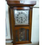 Mahogany wall clock - unmarked (key in office)