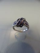 9ct White Gold ring set with either Lilac Zircons or Sapphires