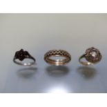 Two silver rings and a gold & silver eternity ring (A/F)