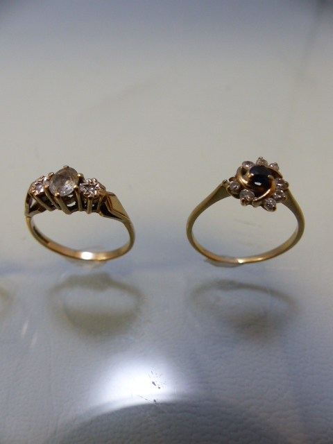 Three ladies 9ct dress rings and an 18ct (total weight 2.2g) three diamond stone ring (all A/F) ( - Image 7 of 9