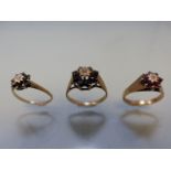 Three ladies 9ct gold rings in the Daisy Cluster style