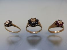 Three ladies 9ct gold rings in the Daisy Cluster style