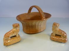 Brampton Pottery - A Pair of Salt glaze spaniels seated on plinths along with a Brampton Pottery