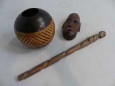 African walking stick , carved with the image of a kneeling man at top end. Small hardwood mask,