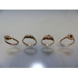 Three ladies 9ct dress rings and an 18ct (total weight 2.2g) three diamond stone ring (all A/F) (
