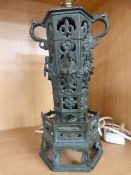 Unusual cast metal twin handled oriental ornament converted to a lamp.